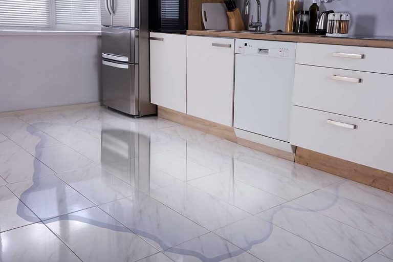 Water damage from appliance in kitchen